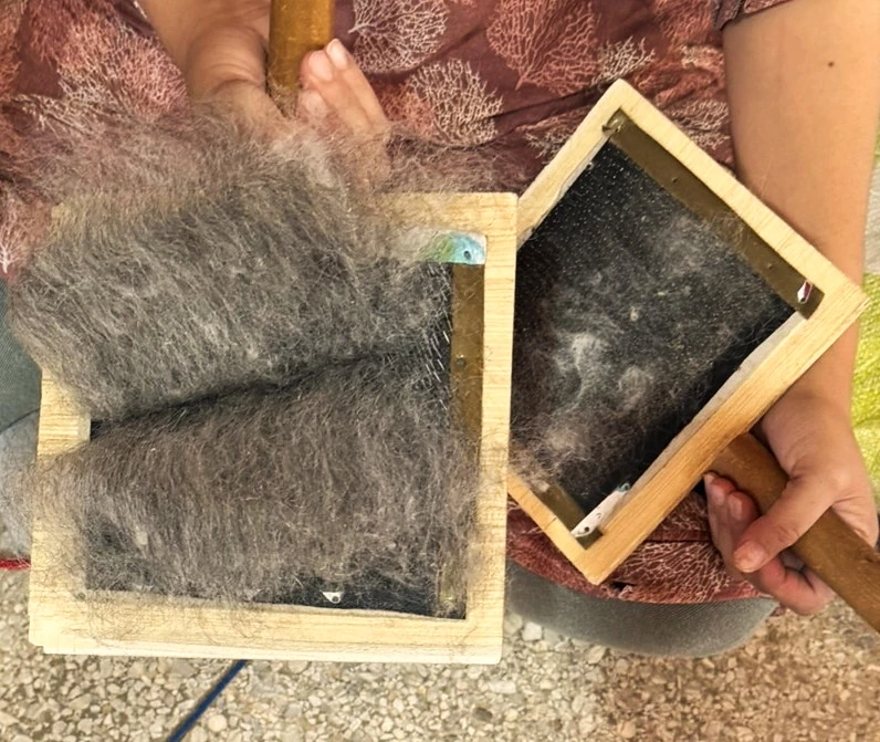 Carding raw wool by hand in Morocco — VOLZAR