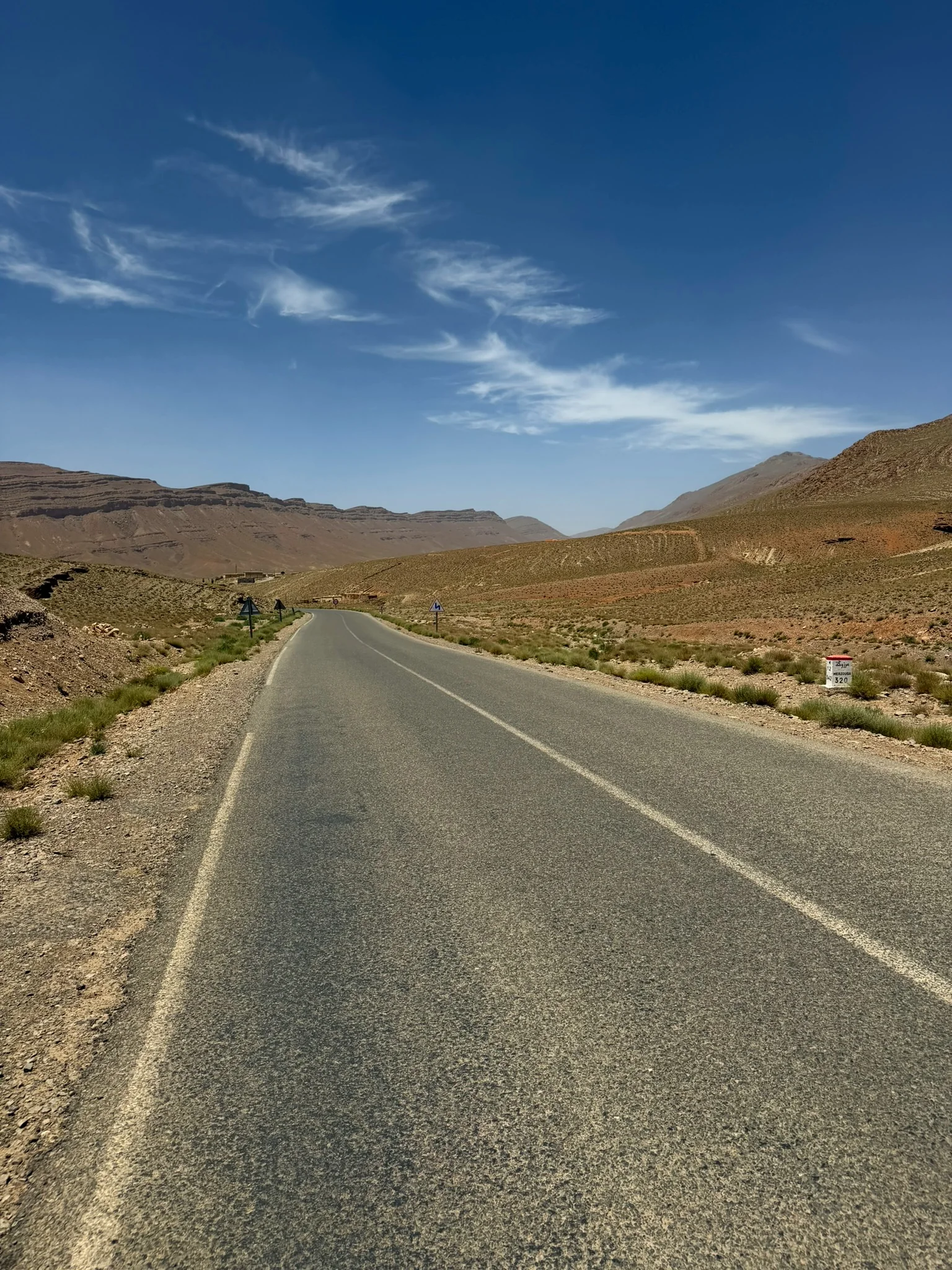 Road through the Atlas Mountains on a rug sourcing trip — VOLZAR